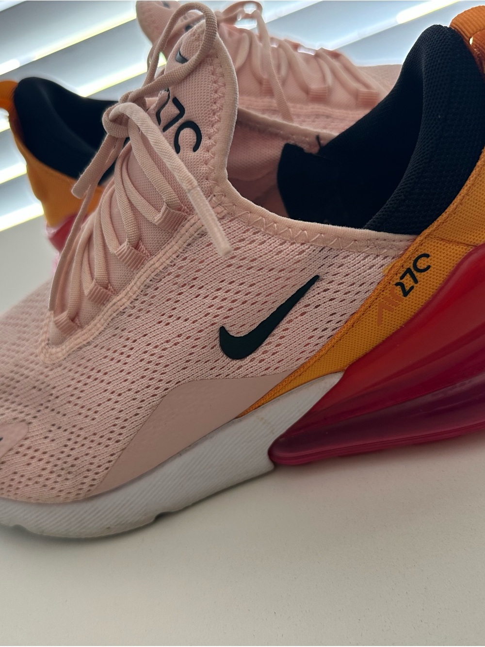 Nike Women’s Pink Mesh Sneakers with Orange and Black Accents